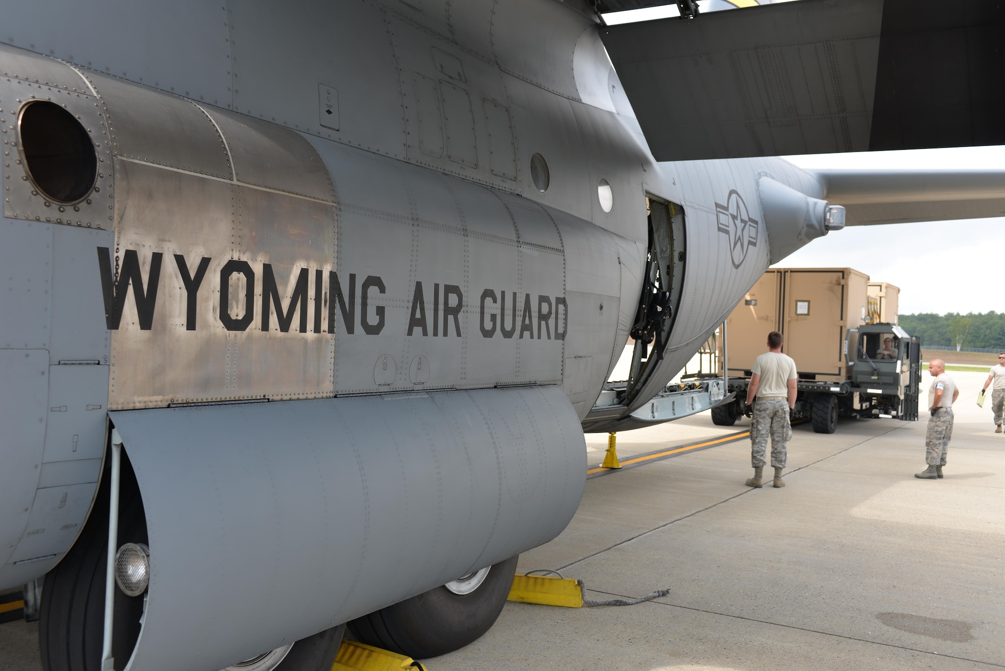 Air National Guardsman from the 157th Air Refueling Wing guide equipment from the Disaster Relief Bed Down Kit (DRBS) onto a C-130 Hercules aircraft from the 187th Airlift Squadron, Cheyenne Air National Guard Base, Wyoming for deployment to the Virgin Islands as part of the Irma Relief effort. The DRBS kit is one of two kits stored here at Pease Air National Guard Base.  (N.H. Air National Guard Photo by Master Sgt. Thomas Johnson)