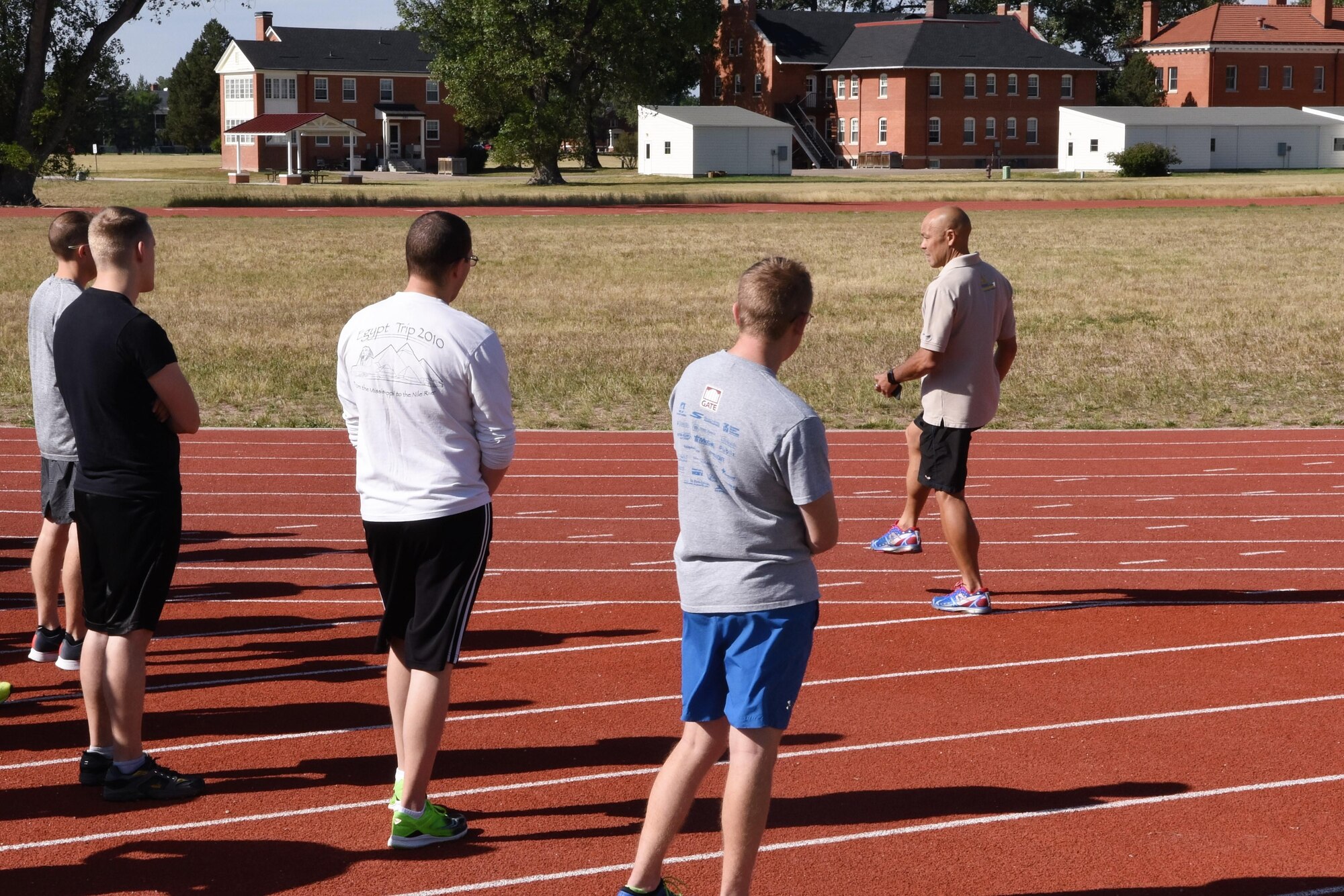 Biomechanical Specialist Ian Adamson and natural running clinic participants practice various drills and running forms to increase the longevity of one’s physical health at F.E. Warren Air Force Base, Wyo., Sept. 13, 2017.