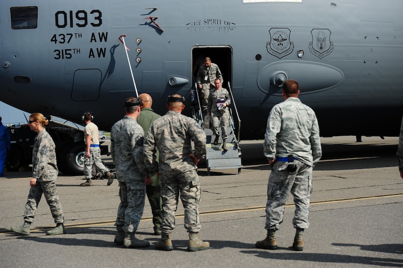 Airmen return with the final C-17 Globemaster III that was evacuated here due to Hurricane Irma’s potential landfall Sept. 15, 2017. Twenty-two C-17s were evacuated to alternate locations and eight were diverted in response to the hurricane. Airmen from the 437th Aircraft Maintenance Squadron ensured the relocated aircraft were maintained and prepared to conduct hurricane recovery operations from alternate installations, including Scott Air Force Base, Ill.
