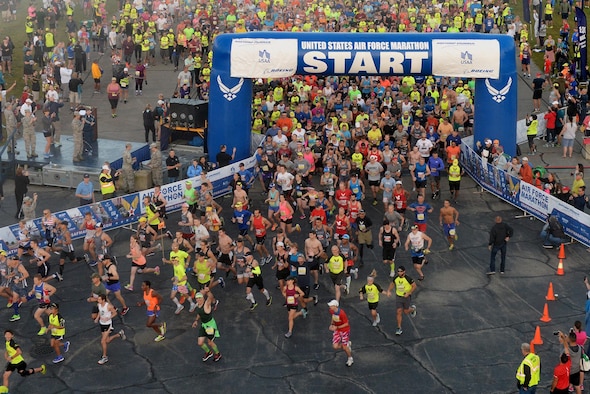 Runners take off for the start of the 21st annual U.S. Air Force Marathon Sept. 16, 2017 at Wright-Patterson Air Force Base.  Over 13,500 runners participated in a 5K, 10K, half and full marathon supported by more than 2,400 volunteers.  (U.S. Air Force photo / Wesley Farnsworth)
