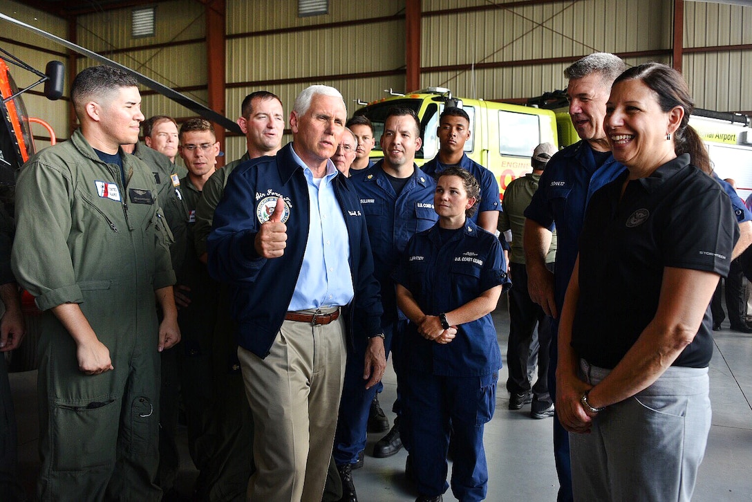 Leaders meet with Coast Guard members.