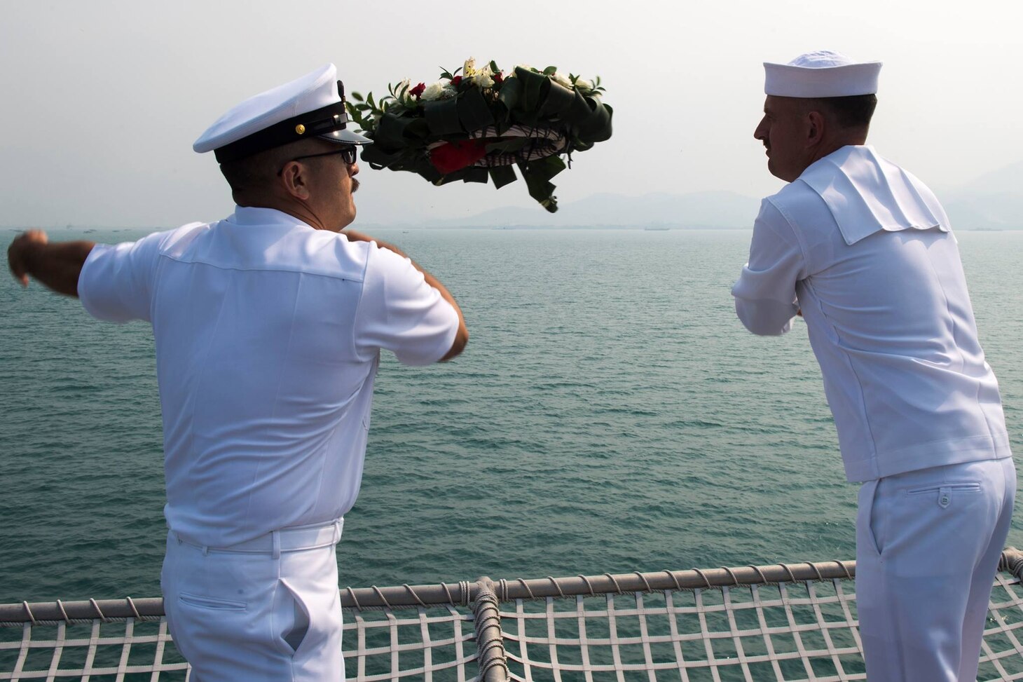 JAKARTA, Indonesia (Sep. 14, 2017) Aviation Electrician's Mate 2nd Class Ashley Bennett mans the rails as the littoral combat ship USS Coronado (LCS 4) pulls into Jakarta, Indonesia for a "Big Top" reception. Coronado is on a rotational deployment in U.S. 7th Fleet area of responsibility, patrolling the region's littorals and working hull-to-hull with partner navies to provide 7th Fleet with the flexible capabilities it needs now and in the future.