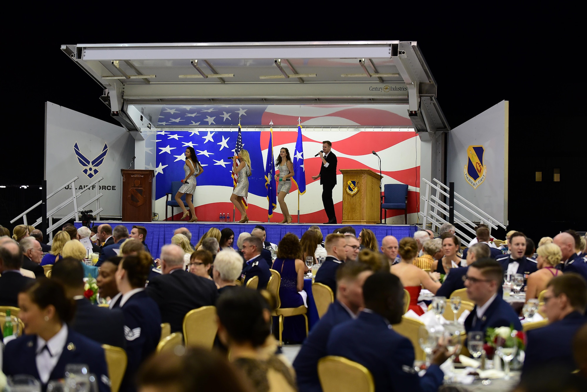 The USO Show Troupe performs during the 4th Fighter Wing 75th Anniversary Gala, Sept. 16, 2017, at Seymour Johnson Air Force Base, North Carolina. More than 400 people attended the gala. (U.S. Air Force photo by Airman 1st Class Kenneth Boyton)