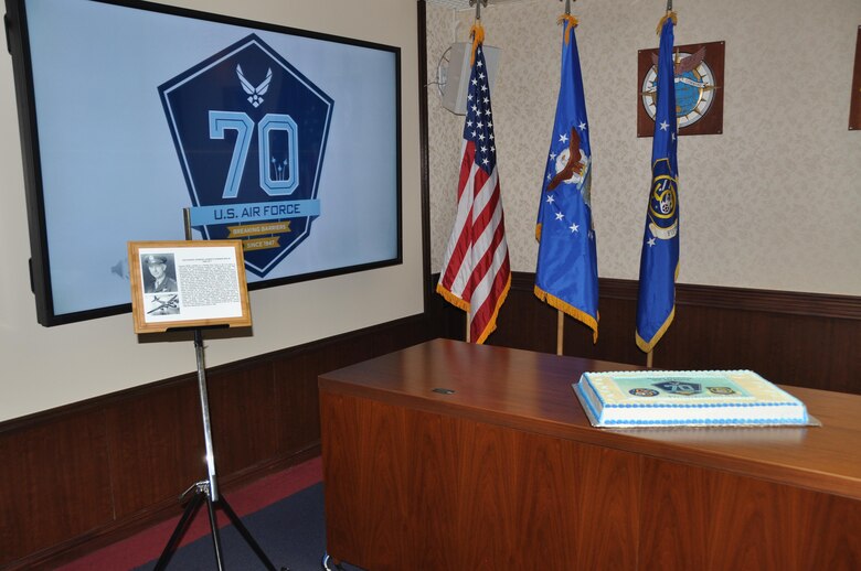 On display in the newly named “Wolfe Conference Room” is the dedication plaque for Lt. Gen. Kenneth Wolfe, the first commander of 5th Air Force in the newly independent service, and the birthday cake for the U.S. Air Force during 5th Air Force’s celebration of the 70th birthday of the Air Force, Sept. 18, 2017. The Staff or Headquarters 5 AF voted to name the commander’s conference room in honor of Wolfe out of three other notable members of 5 AF history recognizing his contributions to the command and the Air Force. (U.S. Air Force photo by Maj. George Tobias)