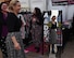 Deborah Herug, 2017 Ramstein Bazaar patron, tries on a dress at the bazaar on the Ramstein Air Base, Germany, Sept 15, 2017.