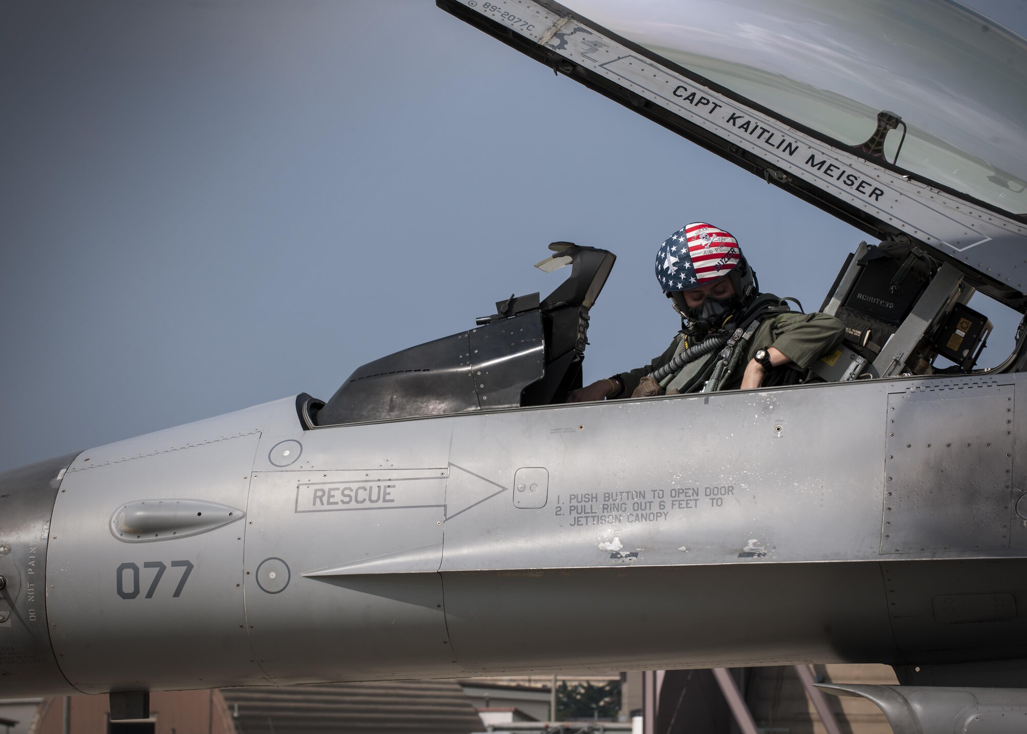 U.S. Air Force Capt. Kaitlin Meiser, 8th Fighter Wing F-16 Fighting Falcon pilot, straps into her assigned aircraft during the “Job Swap” event at Kunsan Air Base, Republic of Korea, Sept. 12, 2017. The week-long event was to give 8th SFS defenders a better look at the assets that they are protecting day in and day out. (U.S. Air Force photo by Staff Sgt. Victoria H. Taylor)