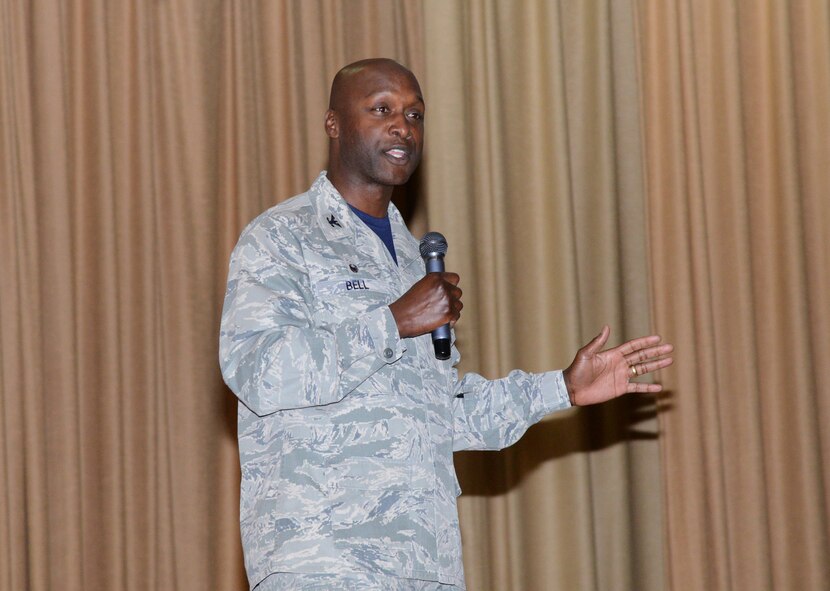 Col. Kenyon Bell, 72nd Air Base Wing commander, speaks during the Still In The Fight  luncheon Sept. 8 at the base theater.