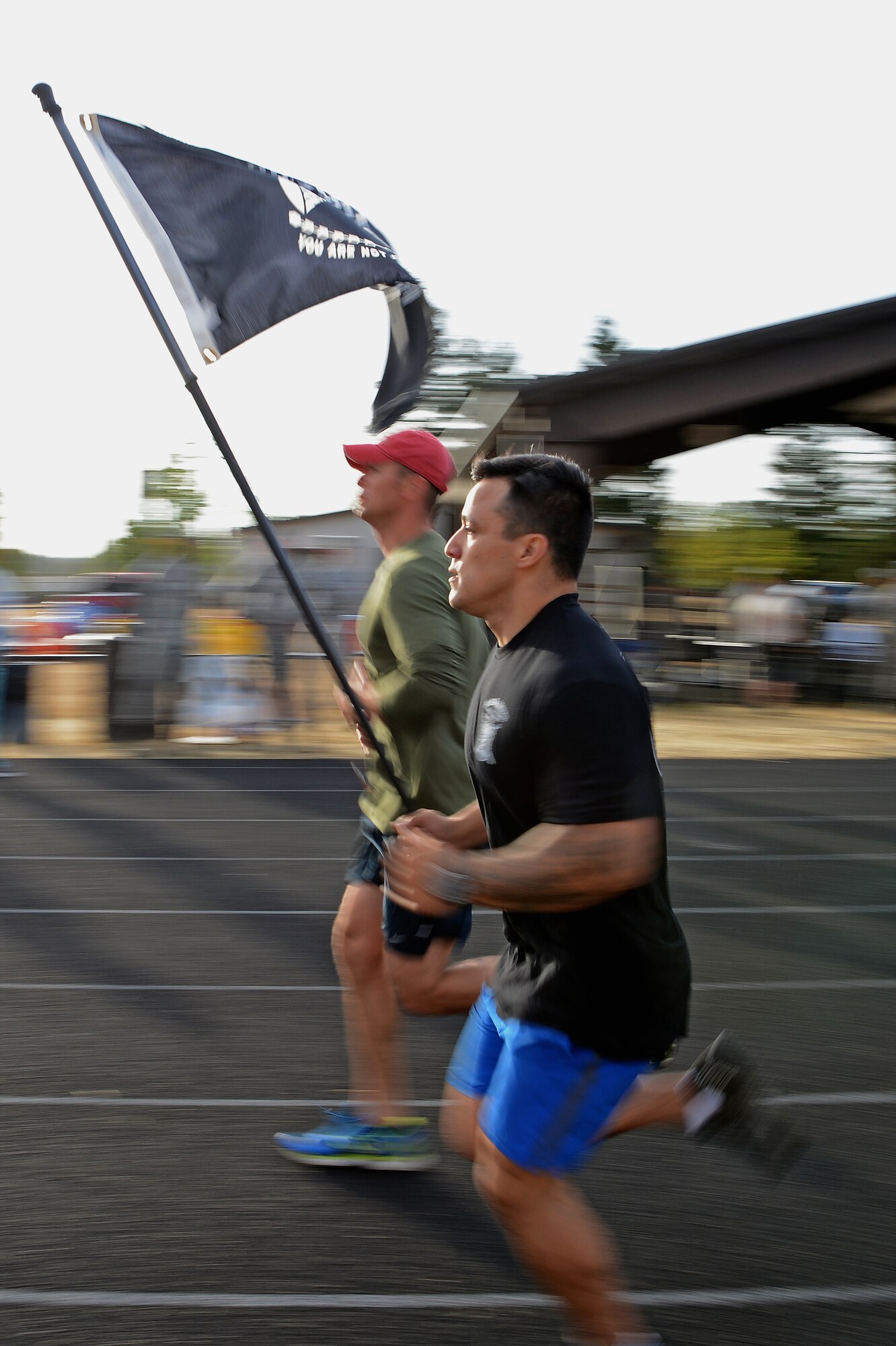 Staff Sgt. Daniel Aguirre, 446th Security Forces Squadron fire team member, run at the McChord outdoor track during the 24-Hour POW/MIA Run Sept. 14, 2017, at Joint Base Lewis-McChord, Wash.