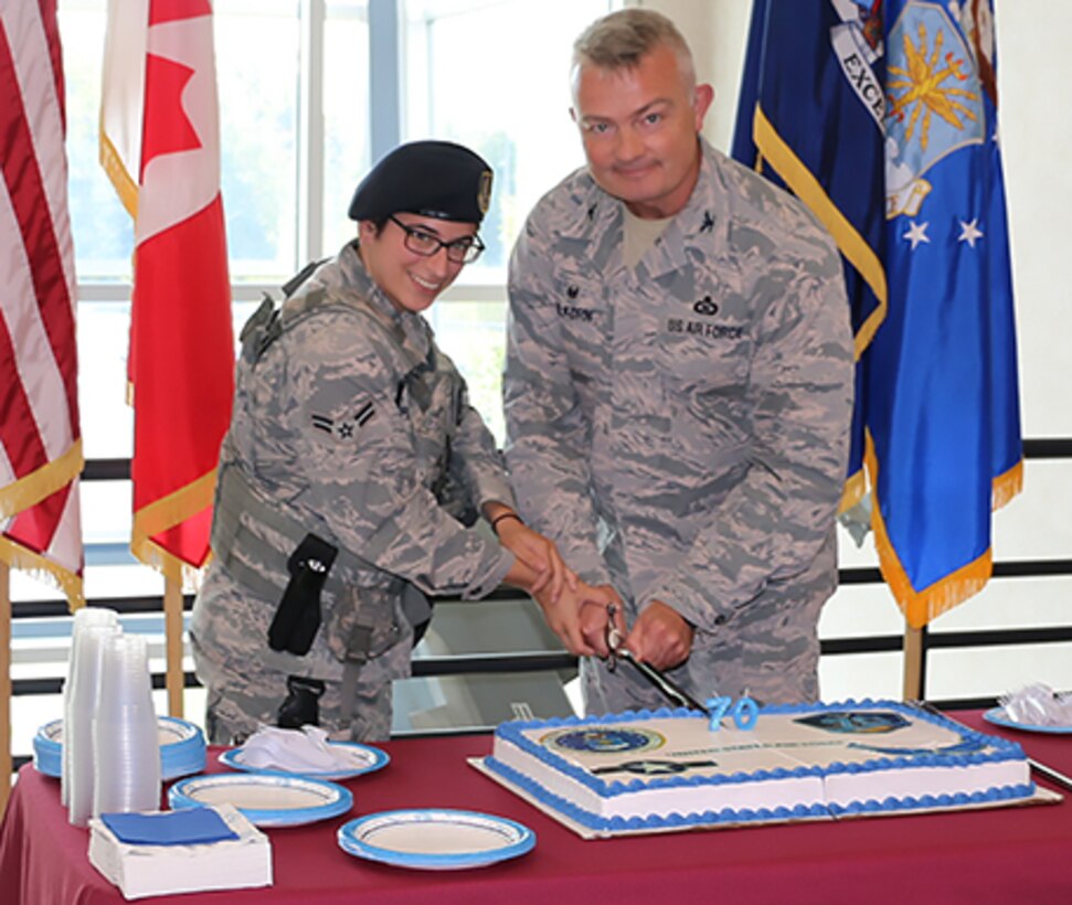 EADS CC and Youngest Airmen Cut Birthday Cake
