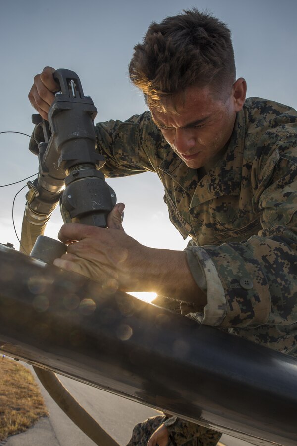 Cpl. Elliot Cameron, a bulk fuel specialist with Marine Wing Support Squadron 473, 4th Marine Aircraft Wing, Marine Forces Reserve, refuels a civilian C12 airplane that delivered supplies and water to the affected areas of Florida Keys, at The Florida Keys Marathon International Airport, at Marathon, Fla. Sept. 14, 2017. Marines with MWSS-473 established a forward arming and refueling point to provide support to federal, state and local agencies, to assist in their search and rescue operations in wake of Hurricane Irma. (U.S. Marine Corps photo by Lance Cpl. Niles Lee/Released)