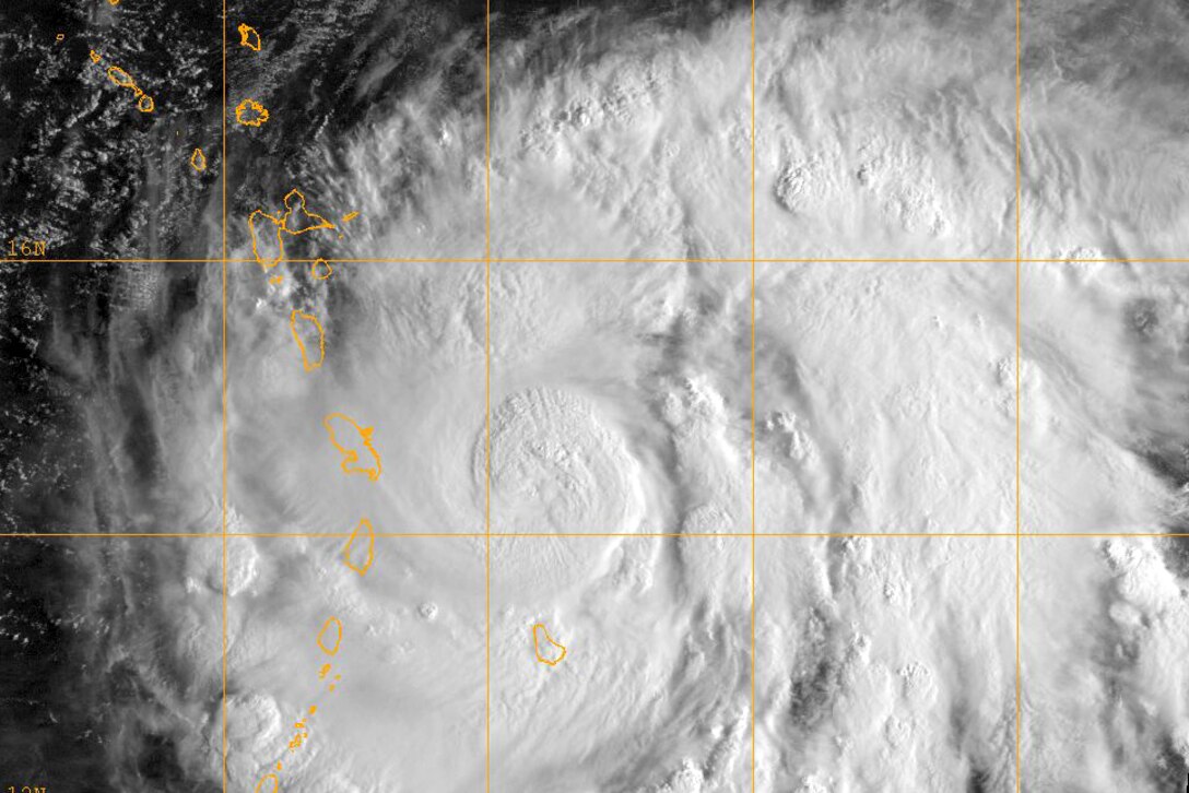 A black and white satellite image of a hurricane.