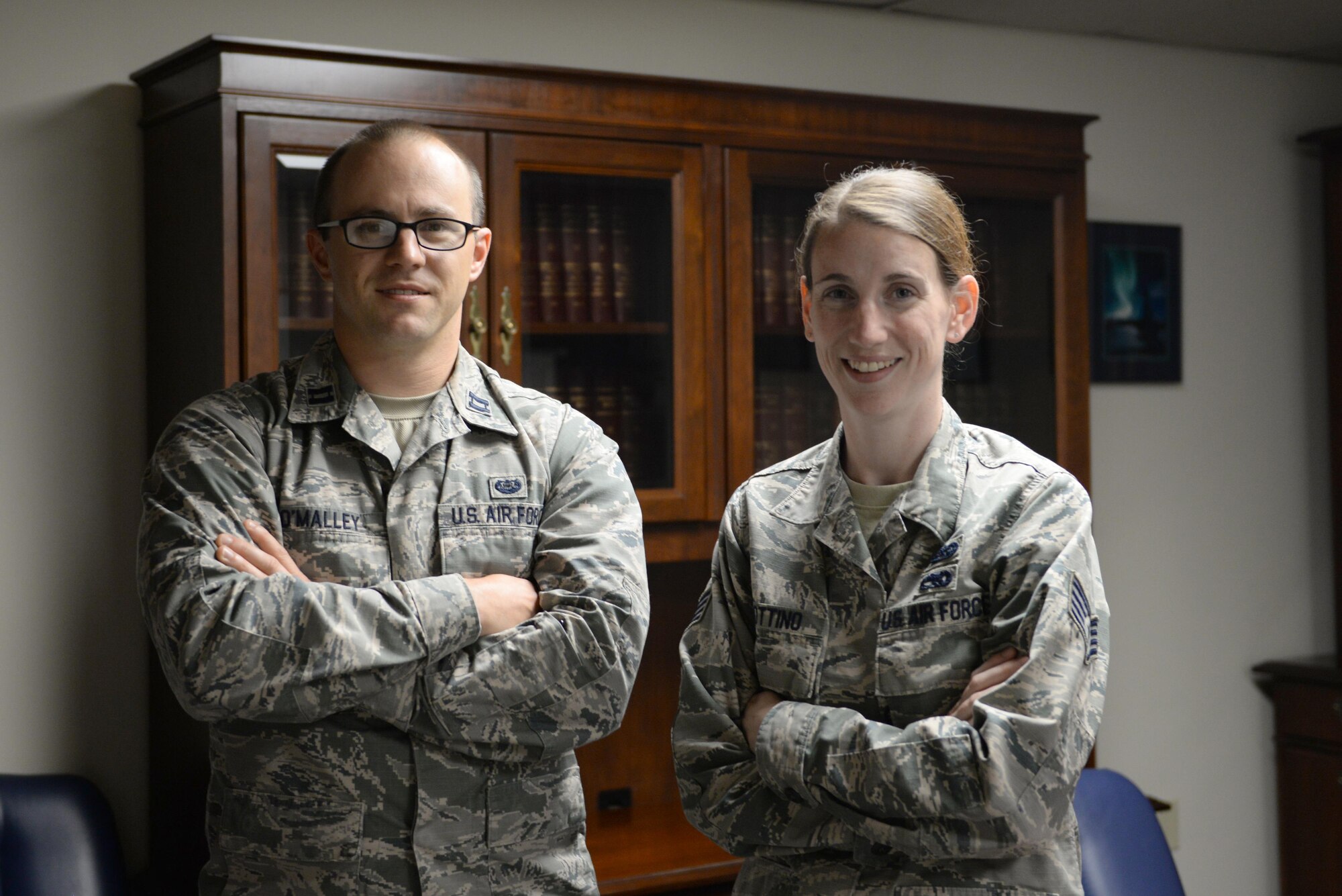U.S. Air Force Capt. Brandon O’Malley, the Area Defense Counsel (ADC) for Eielson Air Force Base (AFB), poses for a photo with Staff Sgt. Kimberly Bottino, a defense paralegal with the ADC, August 23, 2017, at Eielson AFB, Alaska. O’Malley and Bottino are the new ADC team to represent Eielson’s Airmen in the case of legal trouble. (U.S. Air Force photo by Senior Airman Cassie Whitman)