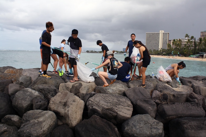 More than 80 volunteers scoured Fort DeRussy park and beach berm Sept. 9, picking up trash and clearing debris as part of this year's National Public Lands Day celebrations, including Junior Reserve Officers Training Course (JROTC) students from Punahou High School and other local schools led by Lt. Col. (ret.) Robert Takao, commander of the JROTC at Punahou High School.