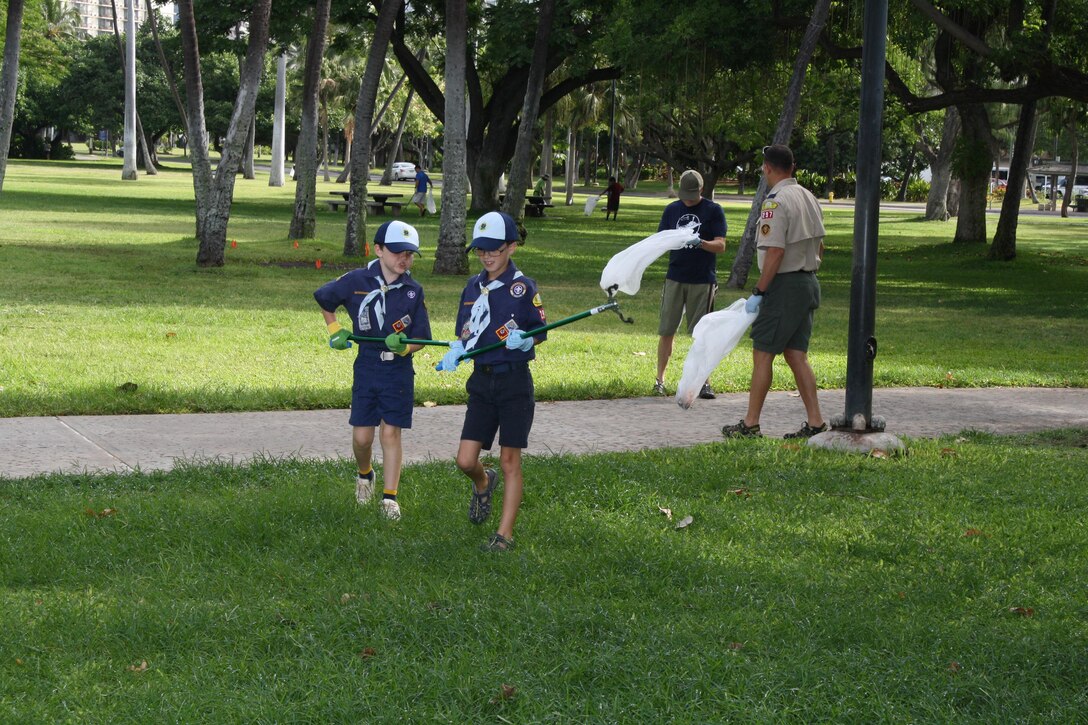 More than 80 volunteers scoured Fort DeRussy park and beach berm Sept. 9, picking up trash and clearing debris as part of this year's National Public Lands Day celebrations, including Boy Scouts and Cub Scouts from Troop 127 at Joint Base Pearl Harbor-Hickam.