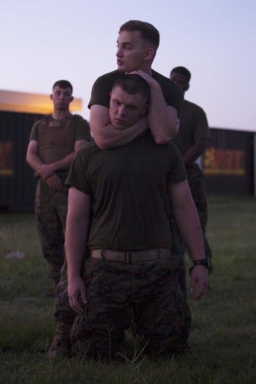 Cpl. Jody Scott teaches his Marines how to execute a proper choke technique