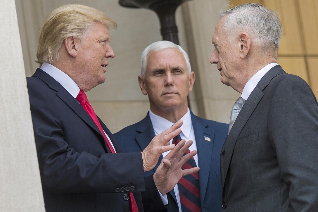 President Donald J. Trump and the vice president talk with Defense Secretary Jim Mattis.