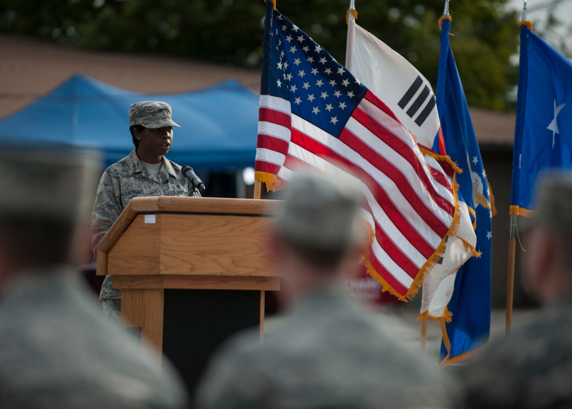 U.S. Air Force Tech. Sgt. Chanute Lockhart, 8th Medical Operations Squadron emergency services tech, speaks during the closing ceremony of the POW/MIA Recognition Day at Kunsan Air Base, Republic of Korea, Sept. 15, 2017. The day was established by an Act of Congress, by the passage of Section 1082 of the 1998 Defense Authorization Act and is one of six days that the POW/MIA Flag can be flown. (U.S. Air Force photo by Staff Sgt. Victoria H. Taylor)