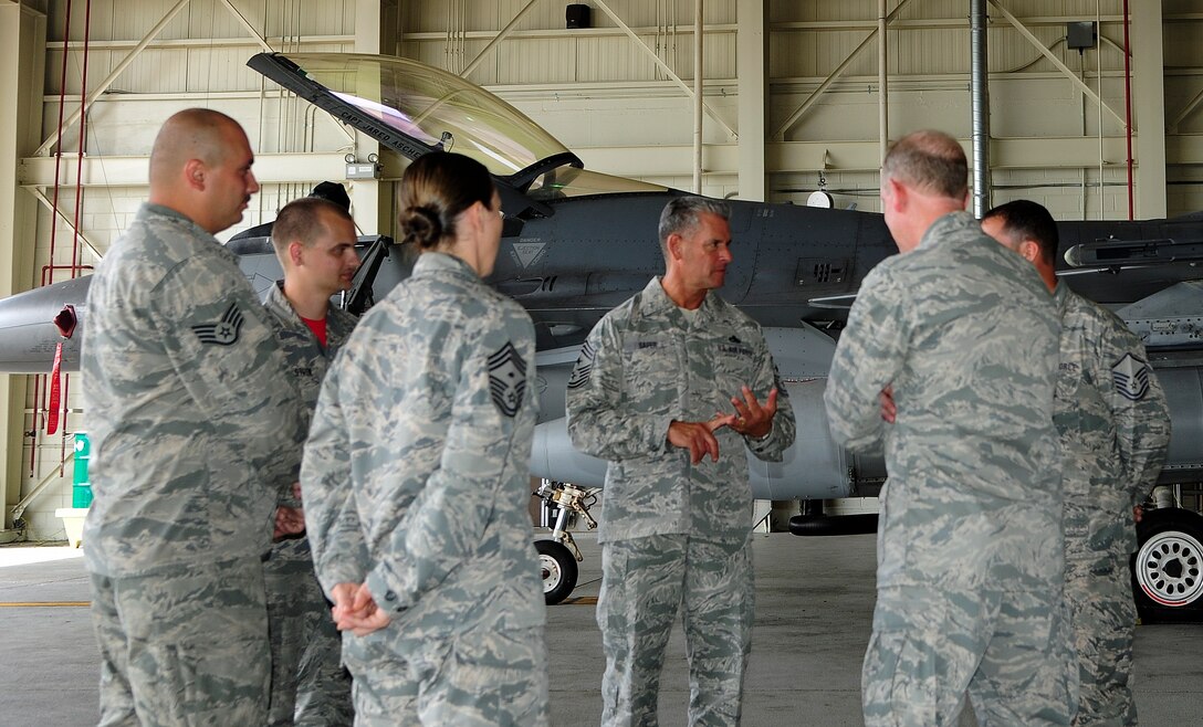 U.S. Air Force Chief Master Sgt. Thomas Safer, 115th Fighter Wing command chief, speaks with a group of Airmen from the 176th Air Expeditionary Maintenance Unit, at Kunsan Air Base, Republic of Korea, Sept. 15, 2017. Safer visited the Airmen who have integrated with the 8th Fighter Wing to defend the base, accept follow-on forces and take the fight north. Airmen from the 115th FW deployed to Kunsan for a 4-month rotation as part of a Theater Security Package. (U.S. Air Force photo by Senior Airman Colby L. Hardin)