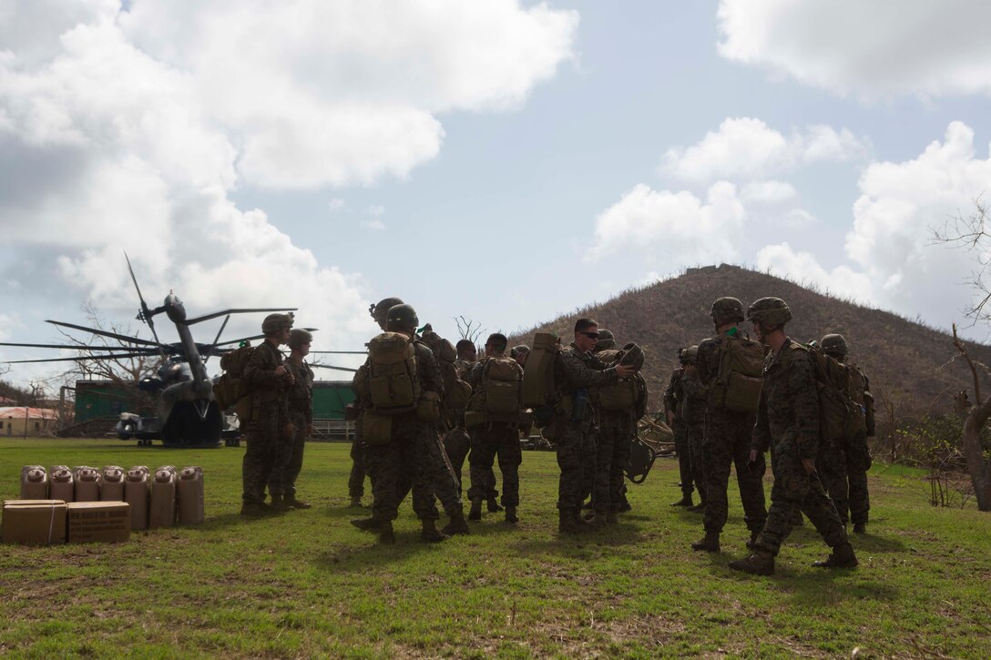 U.S. Marines and Sailors with Battalion Landing Team 2nd Battalion, 6th Marine Regiment, 26th Marine Expeditionary Unit (MEU), arrive in the U.S. Virgin Islands to provide humanitarian aid to those affected in the aftermath of Hurricane Irma in St. John, U.S. Virgin Islands, Sept. 17, 2017. The 26th MEU is supporting authorities in the U.S. Virgin Islands with the combined goal of protecting the lives and safety of those in affected areas. (U.S. Marine Corps photo by Lance Cpl. Santino D. Martinez)