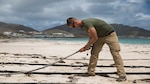 U.S. Marine Cpl. Kyler S. Barrett, a landing support specialist with Joint Task Force - Leeward Islands, assembles the Lightweight Water Purification System at Orient Beach, Saint Martin, Sept. 16, 2017. The Marines arrived to assess possible locations to set up their LWPS in order to produce potable water for communities on the island most affected by Hurricane Irma. At the request of partner nations, JTF-LI deployed aircraft and service members to areas in the eastern Caribbean Sea impacted by the storm. The task force is a U.S. military unit composed of Marines, Soldiers, Sailors, and Airmen, and represents U.S. Southern Command’s primary response to Hurricane Irma.