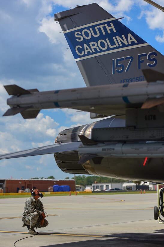 U.S. Airman 1st Class Luke Ikeda, a crew chief assigned to the 169th Aircraft Maintenance Squadron, pre-flights an F-16 Fighting Falcon fighter jet assigned to the South Carolina Air National Guard’s 169th Fighter Wing at McEntire Joint National Guard Base, S.C., Sept. 16, 2017. Ikdea was recognized as an outstanding Airman by his supervisors and his peers and was the Airman Spotlight subject for the month of October. (U.S. Air National Guard photo by Senior Airman Megan Floyd)