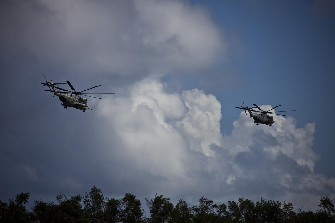 U.S. Marine CH-53E Super Stallion helicopters belonging to Joint Task Force - Leeward Islands take off from Muñiz Air National Guard Base in Carolina, Puerto Rico, Sept. 18, 2017.
