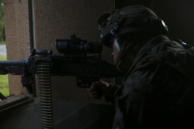 A Marine aims an M240B medium machine gun at the oppositional force during defensive operations at Camp Lejeune, N.C., Sep. 15, 2017. The exercise is part of a Marine Corps Combat Readiness Evaluation to test the unit’s capabilities in a combat environment. The Marine is with 1st Battalion, 6th Marine Regiment. (U.S. Marine Corps photo by Lance Cpl. Holly Pernell)