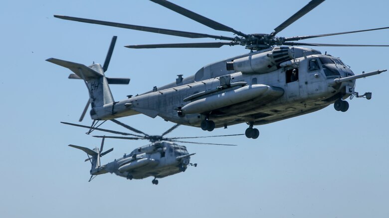 Two CH-53E Super Stallion helicopters prepare to land during aerial insert drills at Camp Lejeune, N.C., Sep. 13, 2017. The exercise is part of a Marine Corps Combat Readiness Evaluation to test the unit’s capabilities in a combat environment. The Marines are with 1st Battalion, 6th Marine Regiment. (U.S. Marine Corps photo by Lance Cpl. Holly Pernell)