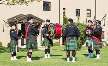 Members of the Dover Fire Pipes and Drums of Dover, Del., play “Amazing Grace” during the National Prisoner of War and Missing in Action Recognition Day ceremony Sept. 15, 2017, on Dover Air Force Base, Del. Positioned left to right, Ryan Knowles, pipes; Michael O’Connor, pipe major; Remy Gooch, bass drum; David Truax, drum sergeant; Timothy Kline, pipes; and Joseph Moran, pipe sergeant. (U.S. Air Force photo by Roland Balik)