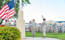 Members of the Dover Air Force Base Honor Guard lower the U.S. flag during the National Prisoner of War and Missing in Action Recognition Day ceremony Sept. 15, 2017, on Dover Air Force Base, Del. The names of 178 fallen service members from previous wars and conflicts that have been repatriated this past year were read by six members of the Armed Forces Medical Examiner System during the ceremony. (U.S. Air Force photo by Roland Balik)