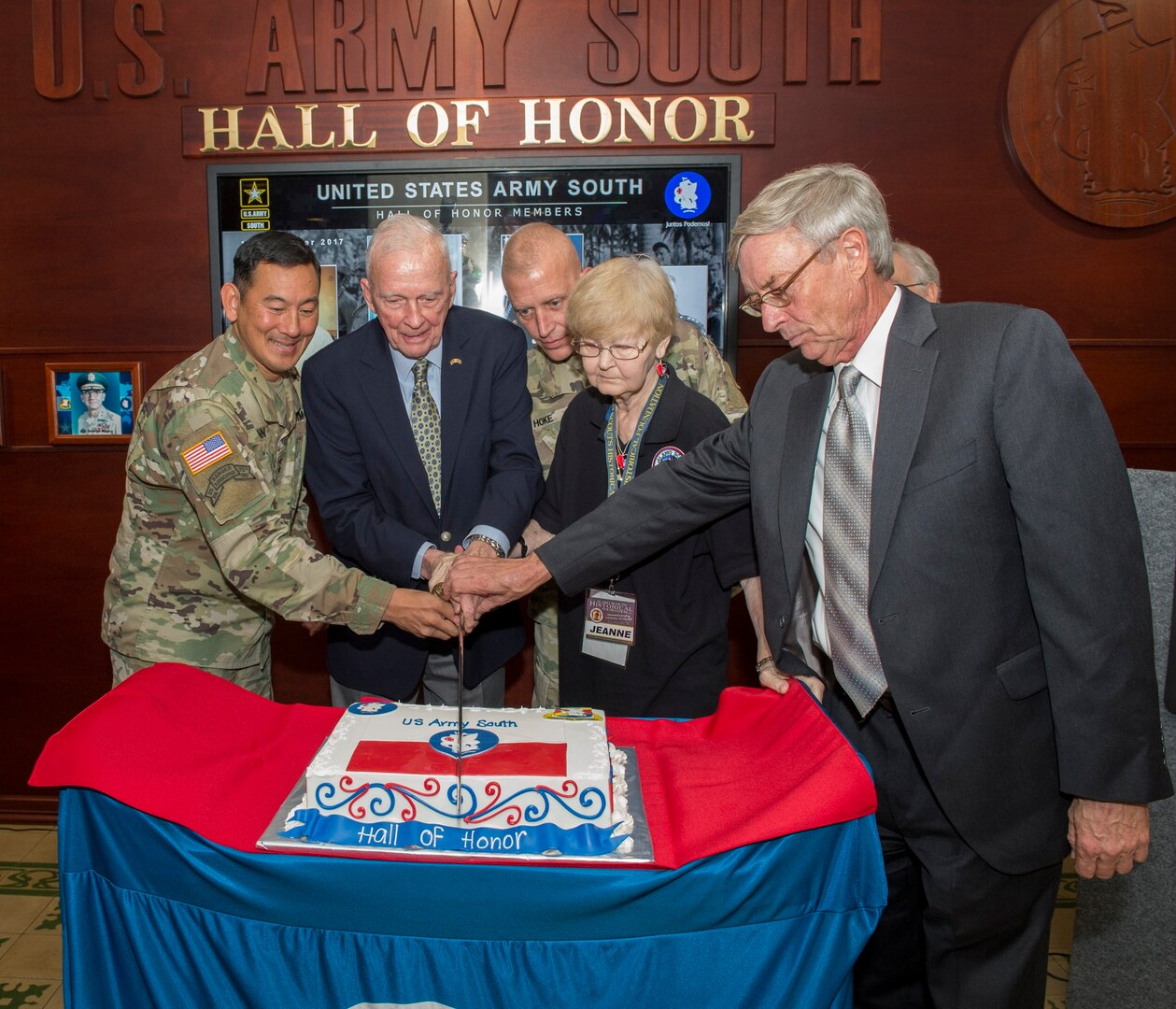Maj. Gen. K.K. Chinn and the family members of two of the inductees Gen. Walter Kruger and Capt. Hal Kopp (Alamo Scouts) along with retired Col. Ralph Puckett cut the cake at the inaugural Hall of Honor ceremony Sept. 14 at Joint Base San Antonio-Fort Sam Houston.