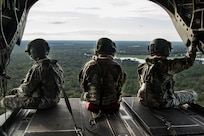 (From left) Sgt. John Harrington, a flight medic from Company C, 3-126th Aviation Regiment, sits next to Staff Sgt. Dave Gulino and Staff Sgt. Chris Moore - all part of the crew of a Connecticut Army National Guard CH-47 Chinook helicopter from Company B, 2-104th General Support Aviation Battalion, while completing a survey mission in northern Florida, Sept. 13, to evaluate river levels and damage along the Santa Fe and Ichetucknee rivers, while ensuring flooded areas were free of stranded civilians.
While conducting reconnaissance, the air crew indicated possible increased water levels, but the areas were deemed clear of any civilians in distress.
The crew of the CH-47 Chinook helicopter included eight of 14 Connecticut National Guard Soldiers currently operating out of the Florida National Guard’s Army Aviation Support Facility No. 1 in Jacksonville, Florida, in support of Hurricane Irma relief and recovery operations. The Connecticut National Guard has more than 40 Soldiers and Airmen who have been supporting hurricane relief efforts in Florida, Texas, Puerto Rico and the U.S. Virgin Islands over the past couple weeks.