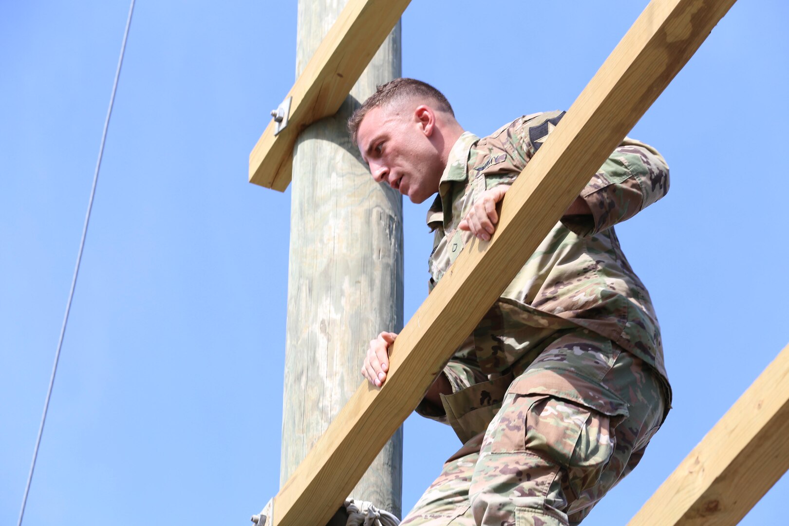 Pfc. Nicholas Angelo, from Camp Humphreys, Korea, participating in obstacle course training at Joint Base San Antonio-Camp Bullis, north of San Antonio, as part of the BOSS Strong Championship which focuses on functional fitness. The program is organized by the U.S. Army Installation Management Command's G9 Family and Morale, Welfare and Recreation division to coordinate with existing facilities and outside contractors to develop the future of functional fitness.