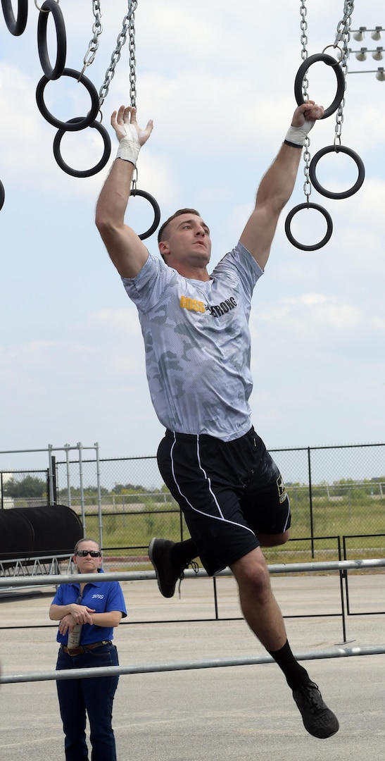 Pfc. Nicholas Angelo of Camp Humphreys, South Korea, maneuvers through a field of rings Sept. 16 on the 2017 BOSS Strong Championship obstacle course at Retama Park in Selma, Texas