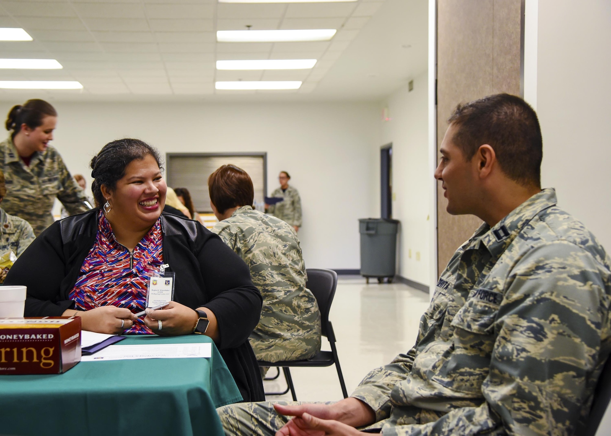 Capt. George Devitta, 23d Medical Group physician’s assistant, left, speaks to Regina K. Wisenbacker, a local medical professional, during a provider collaboration, Sept. 15, 2017, at Moody Air Force Base, Ga. The 23d Medical Group held this to allow base and community providers an opportunity to meet face-to-face to better understand the Airmen they are taking care of and provide feedback to help both sides improve. (U.S. Air Force photo by Airman Eugene Oliver)