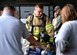 Airman 1st Class Bradyn McIntosh-Oldaker, a firefighter assigned to the 28th Civil Engineer Squadron, demonstrates the Hurst Jaws of Life during a Base Appreciation Day at Ellsworth Air Force Base, S.D., Sept. 16, 2017. The fire department, along with other base agencies set up display tables for event participants to learn more about how they all contribute to the base mission. (U.S. Air Force photo by Senior Airman Denise M. Jenson)