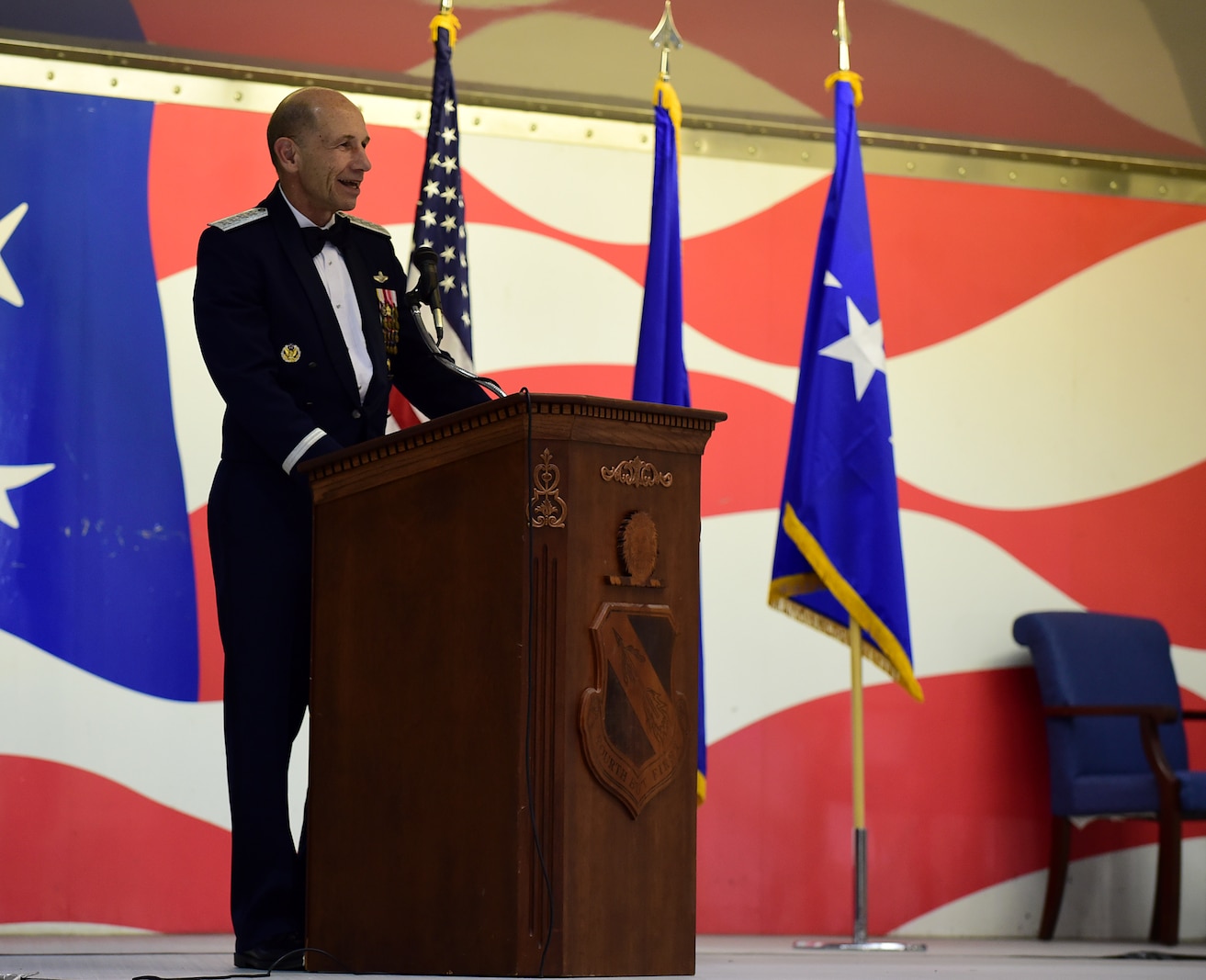 Gen. Mike Holmes, commander of Air Combat Command, delivers a speech during the 4th Fighter Wing 75th Anniversary Gala, Sept. 16, 2017, at Seymour Johnson Air Force Base, North Carolina. Holmes served as the 4 FW commander from Aug. 2004 through Sept. 2006. (U.S. Air Force photo by Airman 1st Class Kenneth Boyton)