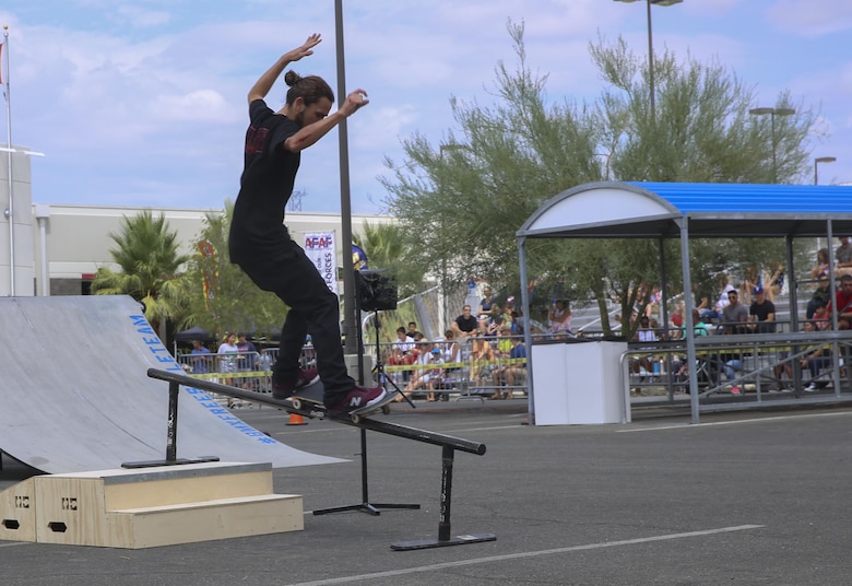 Taylor McClung, professional skater and X Games athlete, performs a 50-50 grind during the X Games Action Sports Show at the Marine Corps Exchange parking lot aboard the Combat Center, Twentynine Palms, Calif., September 9, 2017. The X Games Action Sports Show was a one day event where professional skaters and BMX riders provided entertainment for Marines, sailors and their families.(U.S. Marine Corps photo by Lance Cpl. Christian Lopez)