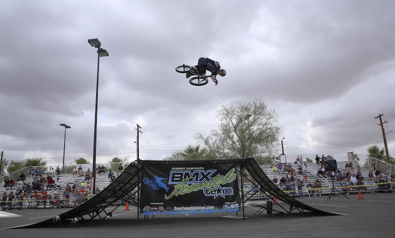 Jared Eberwein, professional BMX rider and X Games athlete, performs a 360 during the X Games Action Sports Show at the Marine Corps Exchange parking lot aboard the Combat Center, Twentynine Palms, Calif., September 9, 2017. The X Games Action Sports Show was a one day event where professional skaters and BMX riders provided entertainment for Marines, sailors and their families.(U.S. Marine Corps photo by Lance Cpl. Christian Lopez)