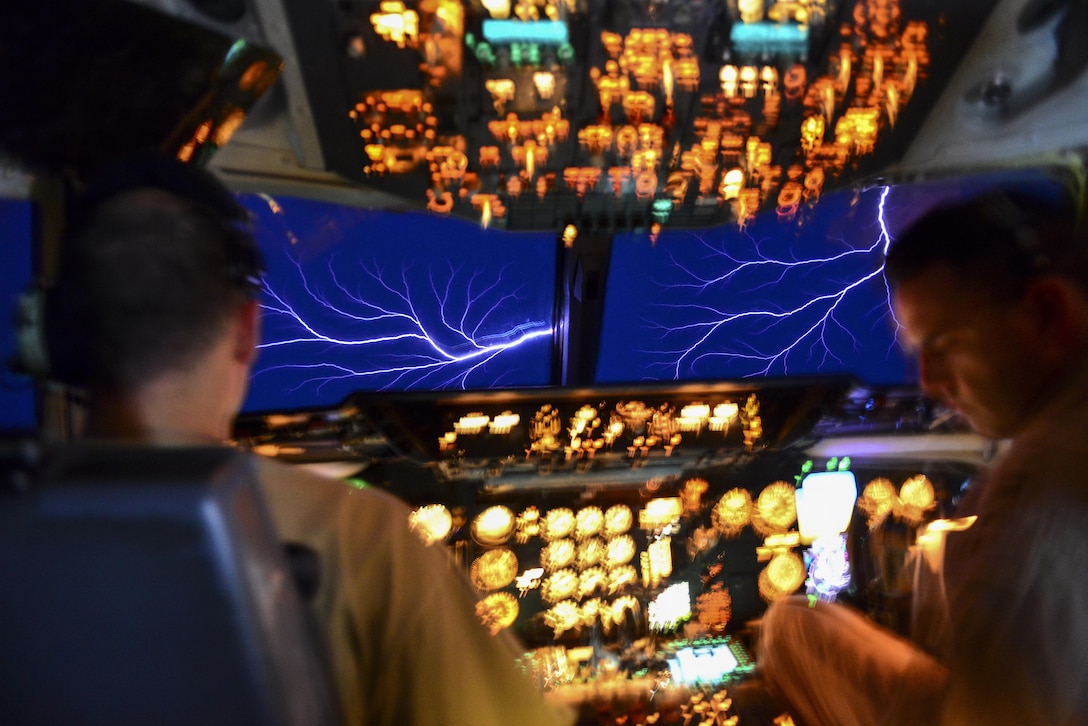 Airmen see sparks while flying an aircraft into a thundercloud.