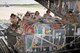 Loadmasters assigned to the 437th Airlift Wing and Airmen with the 167th small air terminal push a pallet onto a C-17 Globemaster aircraft at the 167th Airlift Wing, Sept 10.