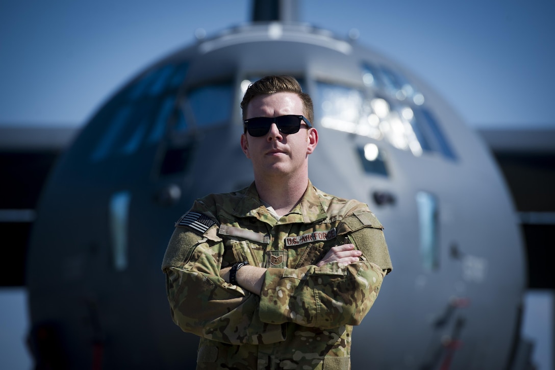 Direct Support Operator from the 25th Intelligence Squadron, U.S. Air Force Tech. Sgt. Nathan, in front of an aircraft.