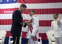 Gen. Joseph L. Votel, commander of U.S. Central Command, speaks at the Naval Forces Central Command (NAVCENT)/U.S. 5th Fleet/Combined Maritime Forces change of command ceremony.