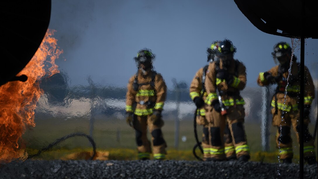 Firefighters put out the heat