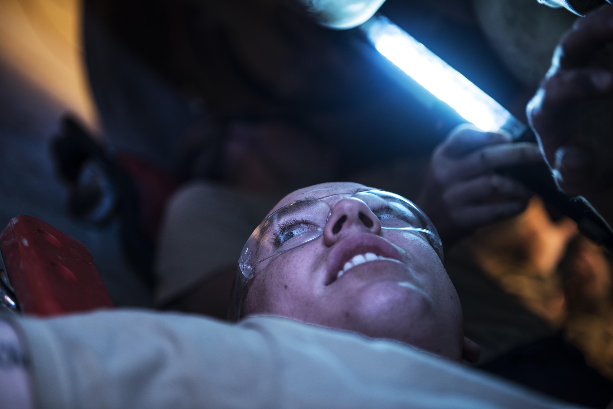 Airman 1st Class Logan Trowbridge, 332nd Expeditionary Logistics Readiness Squadron vehicle maintainer, works beneath a heavy-duty truck, Sept. 14, 2017, in Southwest Asia. Vehicle maintenance Airmen contribute directly to the mission by ensuring that vehicles used to fuel aircraft, deliver food and equipment, maintain installation security, construct new facilities and transport weapons are all kept in good operating condition. (U.S. Air Force photo by Senior Airman Joshua Kleinholz)