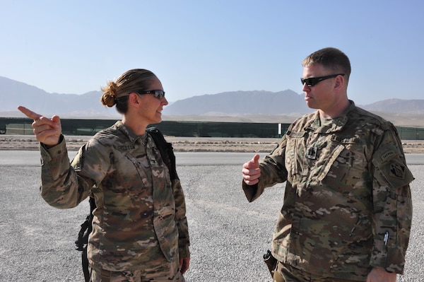 Marmal Resident Office OIC U.S. Army Capt. Daniel Strasser, right, speaks with U.S. Army Corps of Engineers’ Transatlantic Afghanistan District Commander U.S. Army Col. Kimberly Colloton, left, about Mazar-i-Sharif and the surrounding area upon arrival at Camp Marmal, Sept. 19.