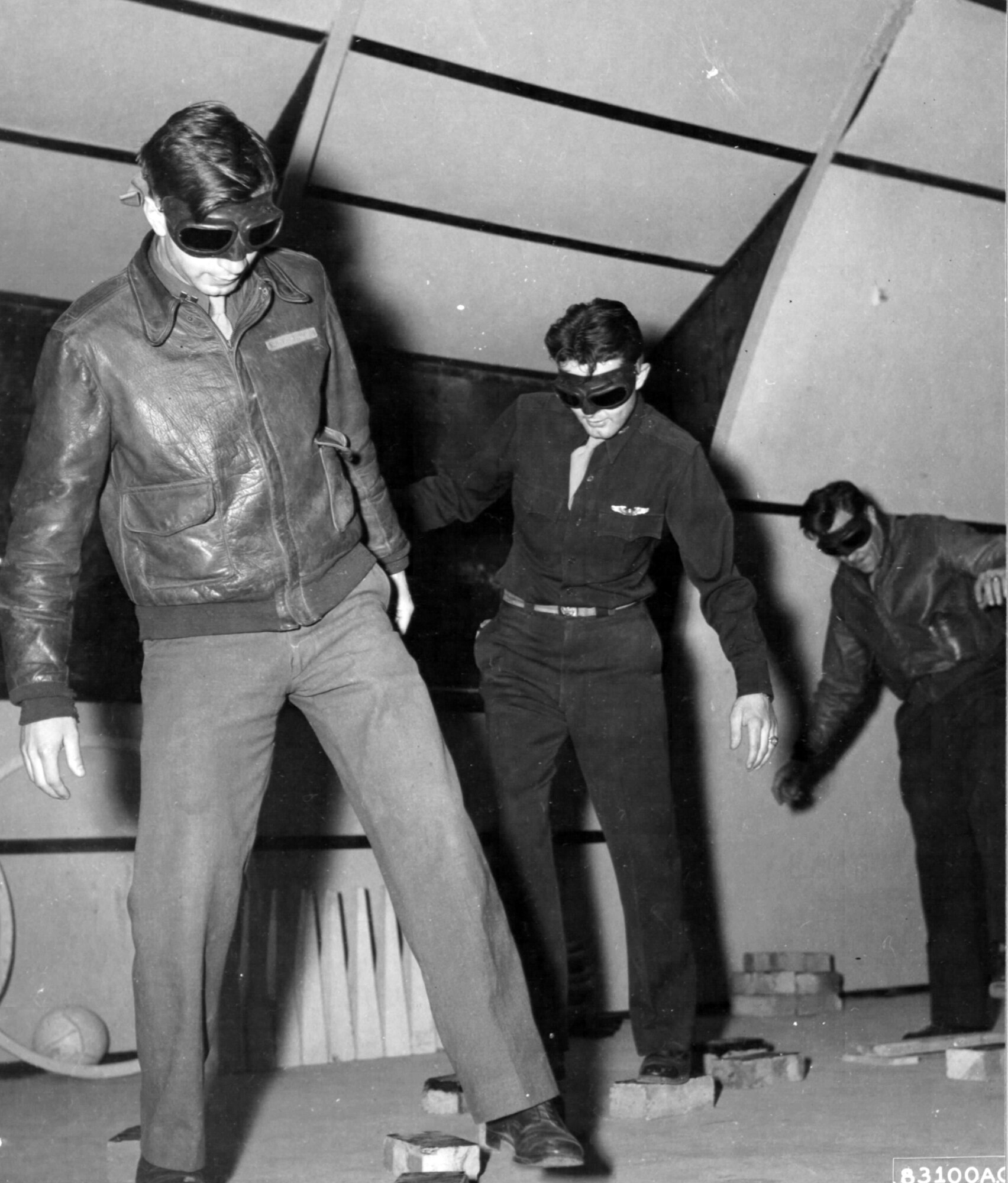 Members of the 9th Troop Carrier Command take tests in night vision classes at an air base in England during WWII. (Photo courtesy of the National Archives)