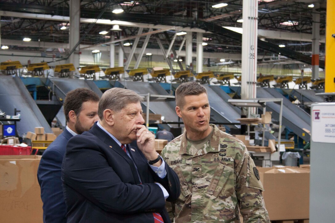 Senator Randy Vulakovich, second from right, tours the Eastern Distribution Center with DLA Distribution Susquehanna, Pennsylvania commander Army Col. Brad Eungard.