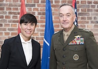 Marine Corps Gen. Joseph F. Dunford Jr., chairman of the Joint Chiefs of Staff, greets Norwegian Defense Minister Ine Marie Eriksen Søreidepass at Akershus Fortress, Sept. 19, 2017.