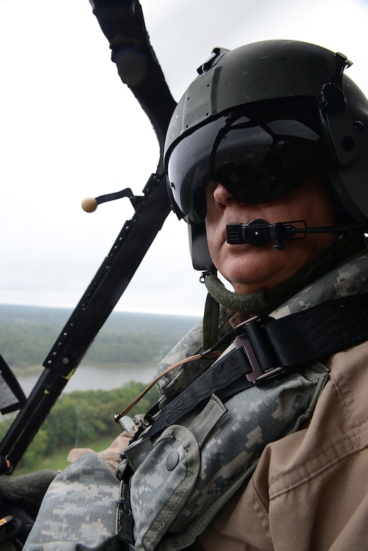 John Zimmerman, Aviation Development Directorate Aviation Support Facility manager, flies the OH-58D “Kiowa Warrior” during one of its final flights over Joint Base Langley-Eustis, Va., Sept. 18, 2017.